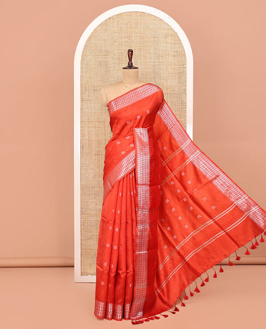 Orange Banana Pith Saree, Mesmerized with Buttas All Over Its Body, Highlighted by Self-Border of Temple and Rudraksham Motifs, Pallu Steeped with Stripes and Buttas, and Paired with a Matching Blouse