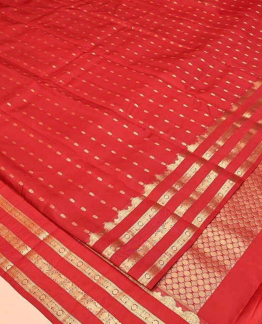 Rust Vasundhara Silk Mix Saree, Beautified with Zari Buttas All Over Its Body, Highlighted by Varisai Pettu Border of Mayil, Laddu Kamalam, and Yaali Designs, Grand Pallu and Paired with a Matching Blouse