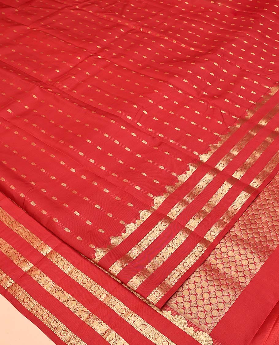 Rust Vasundhara Silk Mix Saree, Beautified with Zari Buttas All Over Its Body, Highlighted by Varisai Pettu Border of Mayil, Laddu Kamalam, and Yaali Designs, Grand Pallu and Paired with a Matching Blouse