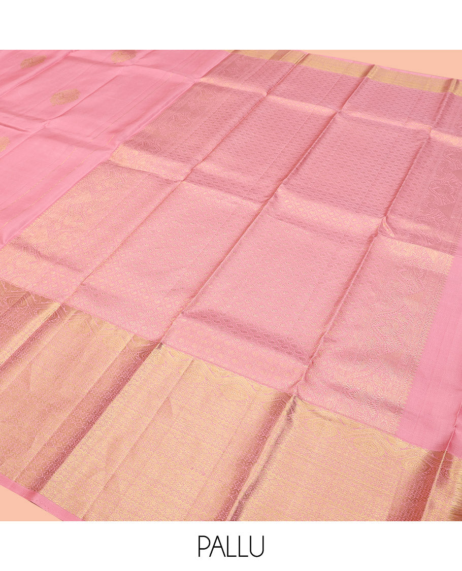 Pink Kanchipuram Silk Saree, Enthralled with Zari Buttas All Over Its Body, Highlighted by a Zari Border of Traditional Designs, Grand Jaal Pallu, and Paired with a Matching Blouse