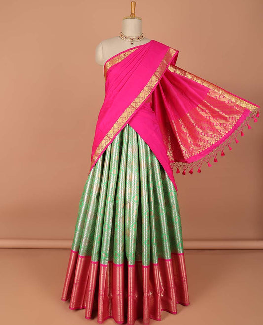 Green argyle design art-silk half saree, contrast traditional zari border, zari design blouse & striped zari design dhavani