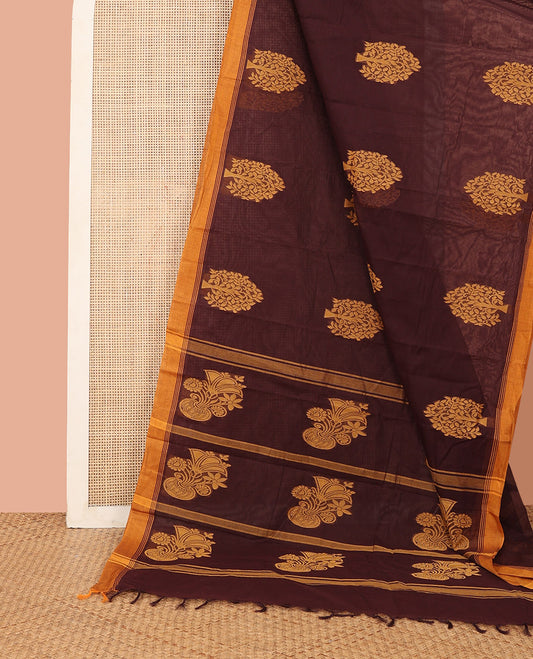 Brown Kanchi Cotton Saree, Beautifully Bedecked with Tree Buttas All Over Its Body, Complemented by Contrast Border, Pallu Depicts Flower Vase Designs, and Paired with a Matching Blouse