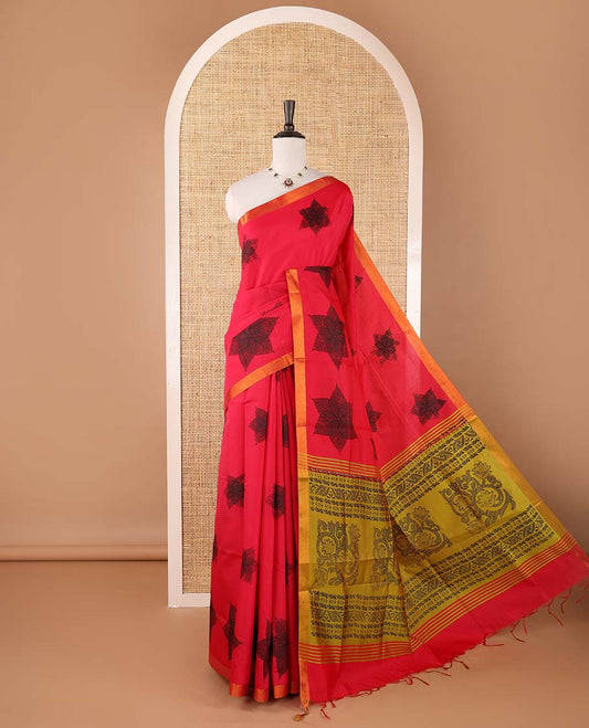 Red six-petal-like leaf motifs printed micro-silk saree, copper zari border, contrast intricate pallu & plain green blouse