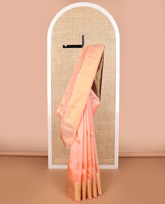 Peach floral buttas vasundhara elite silk saree with self intricate zari design border & floral jaal design pallu