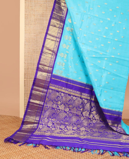 Blue floral design kancheepuram silk saree with contrast border of intricate zari design & floral vine design pallu