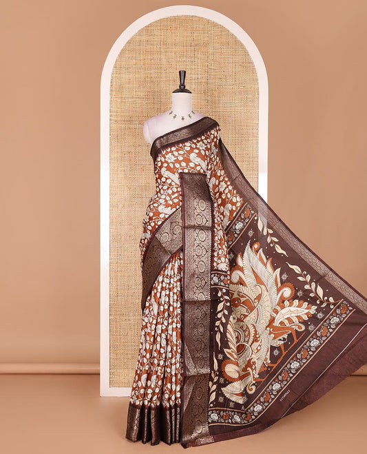 Brown kalamkari floral vine and peacock printed dola silk saree, contrast traditional zari border, peacock printed pallu, and floral vine print blouse