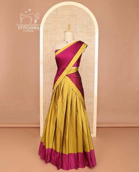 Mustard striped half saree with contrast border, plain blouse & plain, checked border dhavani