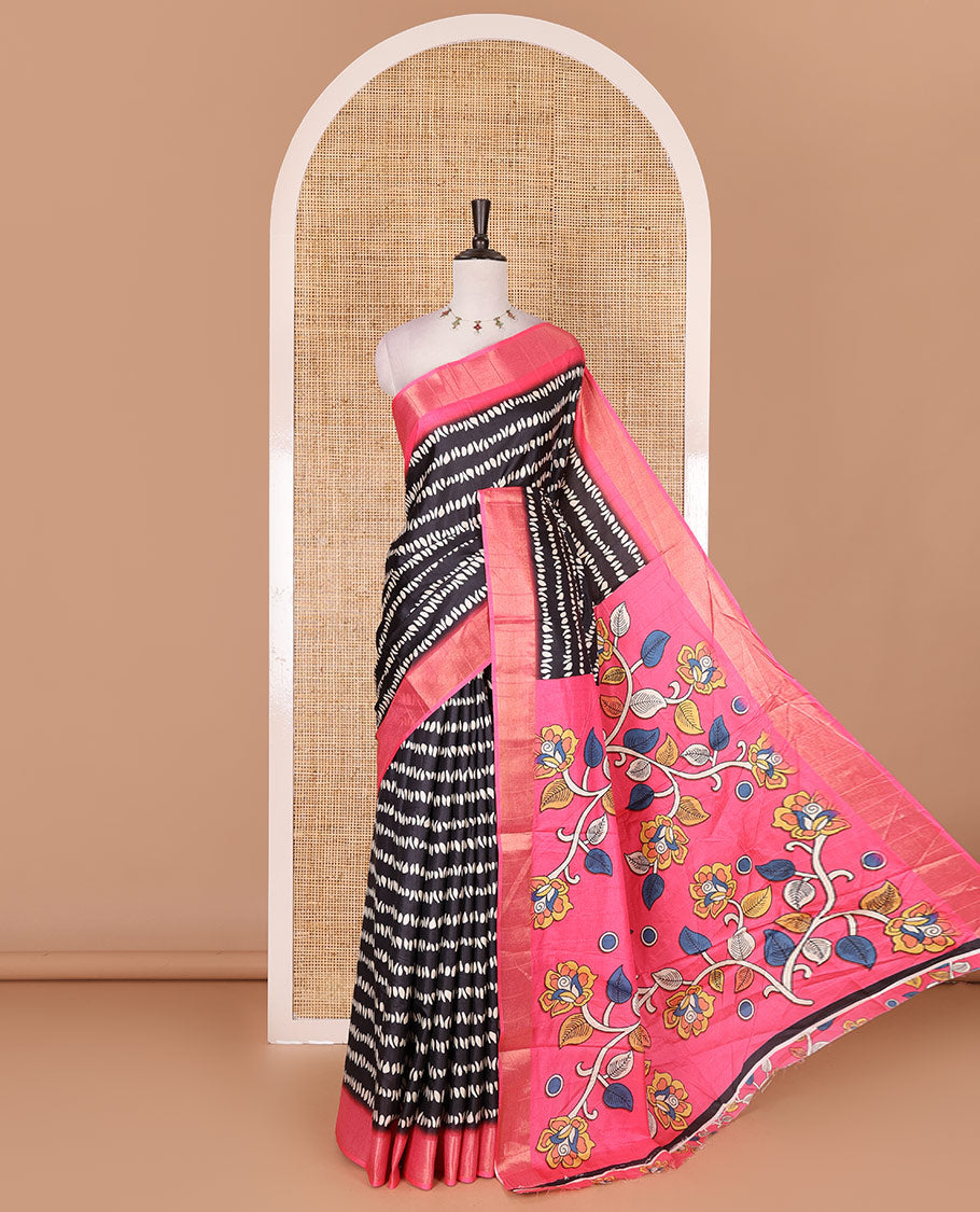 Black geometric patterns printed soft tussar saree, contrast bavanji border, kalamkari floral vine printed pallu, and printed blouse