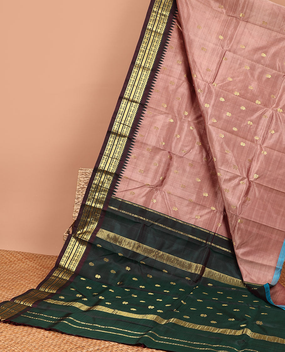 pink floral buttas kancheepuram silk saree with contrast border of rekku, thilakam mokku, paun design & zari design pallu