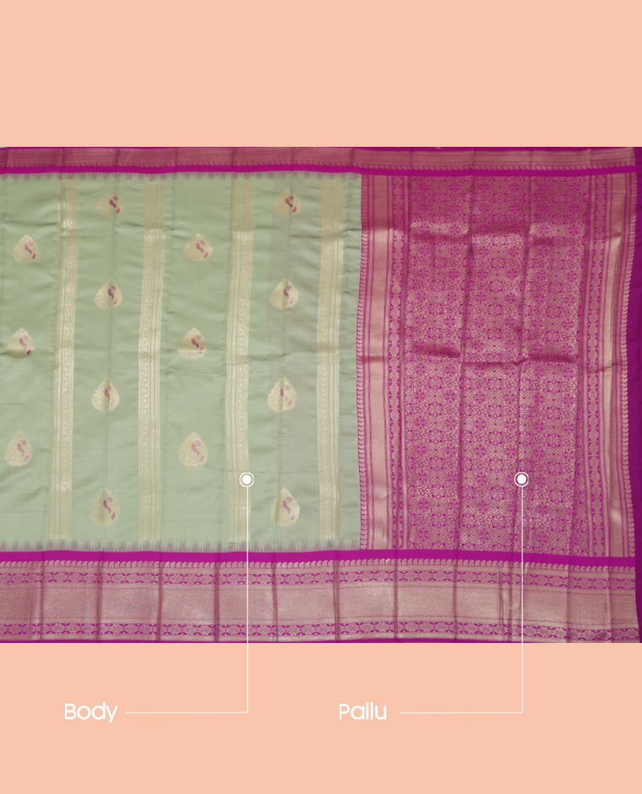 Pista Green Litchi Saree, Enriched with Zari Buttas and Stripes, a Contrast Traditional Zari Border, a Grand Pallu, and a Contrast Blouse