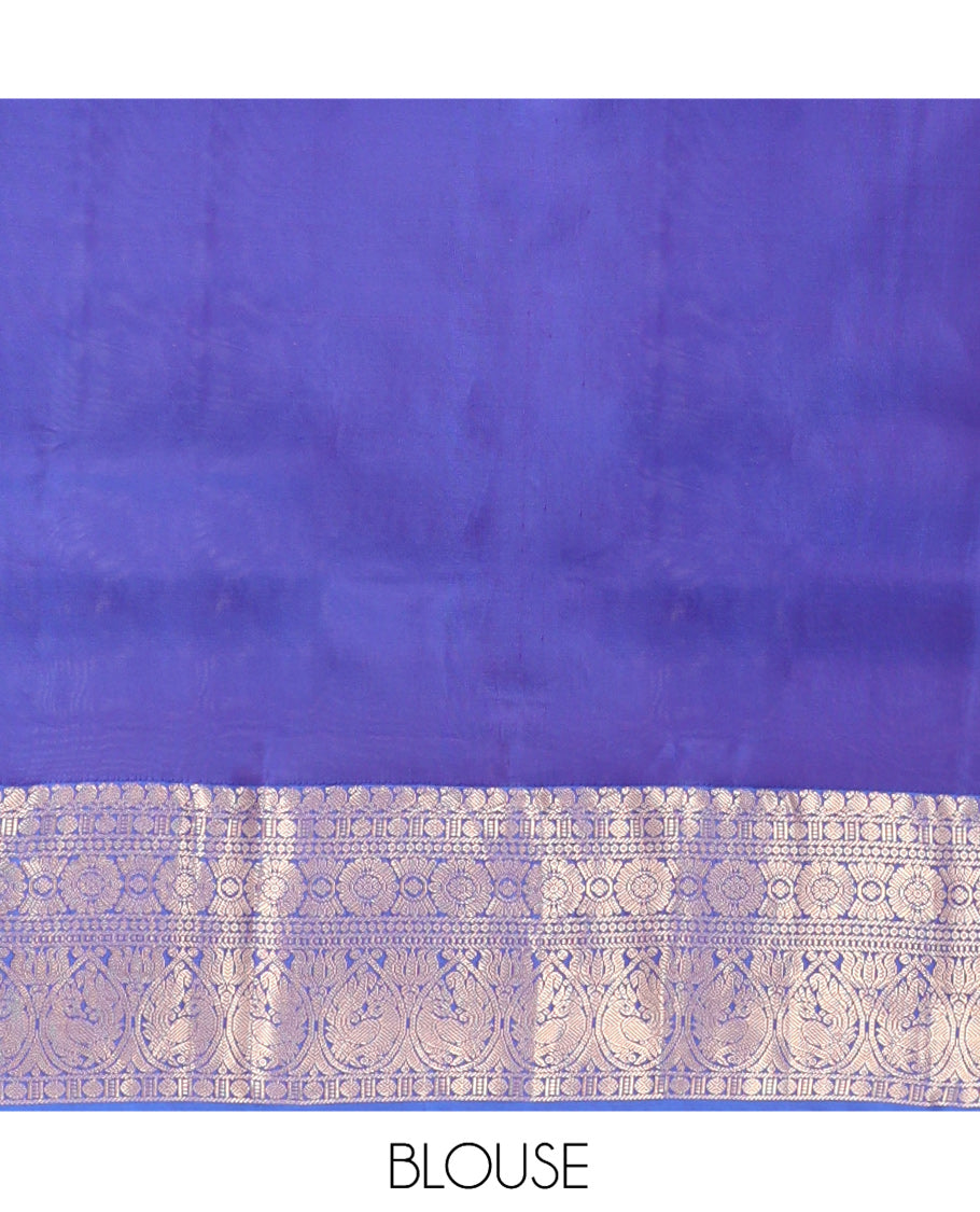 Green Vasundhara Lite Silk Mix Saree, Decked Up with Zari Designs, a Contrast Border of Manga Mokku, Rudraksham, Chakram, and Mayil Designs, Grand Pallu, and a Contrast Blouse