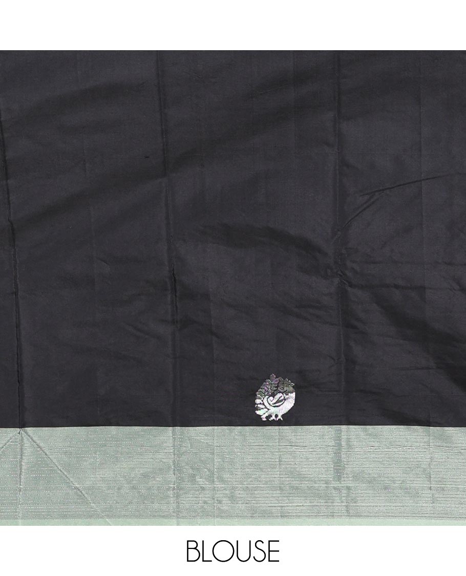Black buttas and peacock buttas woven Kanchi silk saree, contrast satin zari striped border, zari design pallu, and a matching blouse