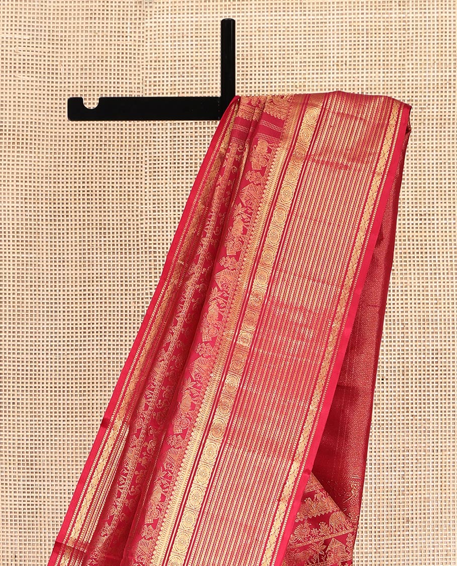 Red Kanchipuram Wedding Silk Saree, Charmingly Accented with Jacquard Design, a Zari Border of Salngai,muthu, Kathir, and Chakram Designs, Mayil Kann Pallu, and a Matching Blouse