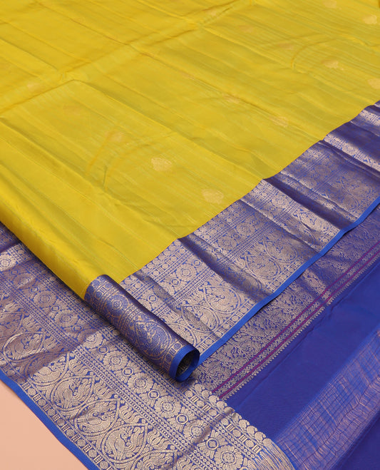 Green Vasundhara Lite Silk Mix Saree, Decked Up with Zari Designs, a Contrast Border of Manga Mokku, Rudraksham, Chakram, and Mayil Designs, Grand Pallu, and a Contrast Blouse