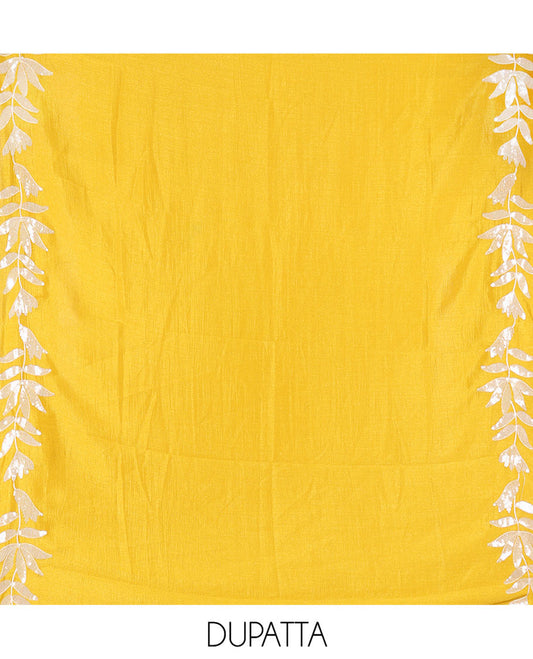 Violet Material Churidar Set, Detailed with Floral Motifs Sequins-Thread Embroidered on Its Vichitra Silk Top, Comes with a Contrast Santoon Bottom, and Paired with a Vichitra Silk Floral Embroidered Scallop Dupatta