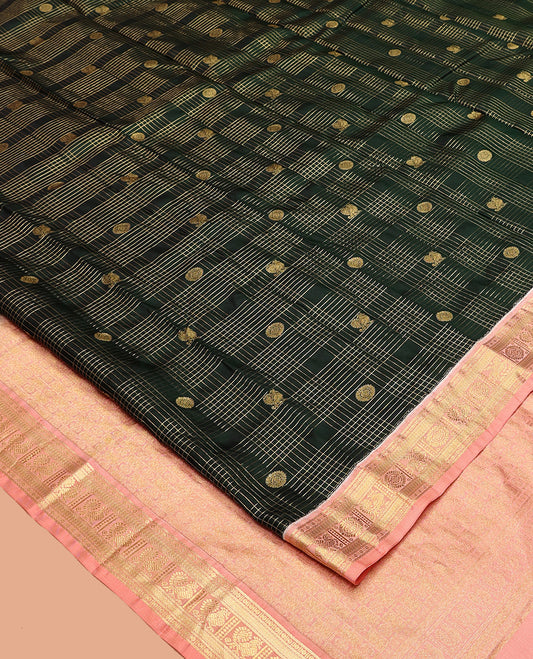 Green Vasundhara Silk Saree, Gracefully Embellished with Zari Butta Enclosed Checks All Over Its Body, Complemented by a Contrast Border of Banaras, Vanki, and Mayil Designs, Grand Pallu, and Paired with a Contrast Blouse