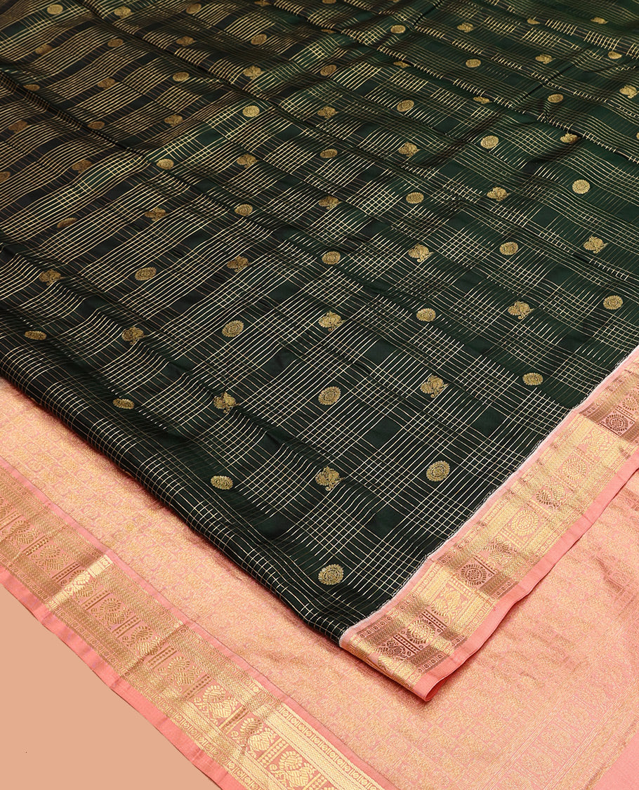 Green Vasundhara Silk Saree, Gracefully Embellished with Zari Butta Enclosed Checks All Over Its Body, Complemented by a Contrast Border of Banaras, Vanki, and Mayil Designs, Grand Pallu, and Paired with a Contrast Blouse