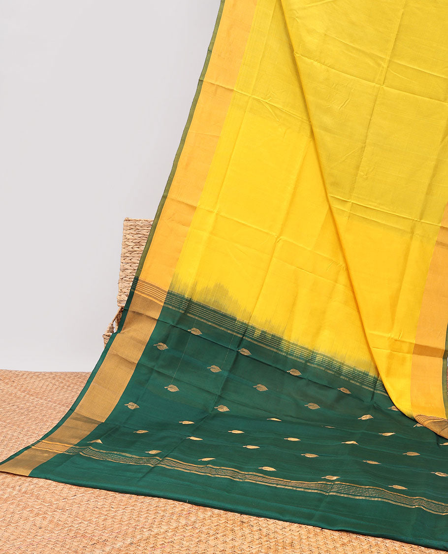 Yellow uppada silk saree with contrast plain border & floral buttas pallu