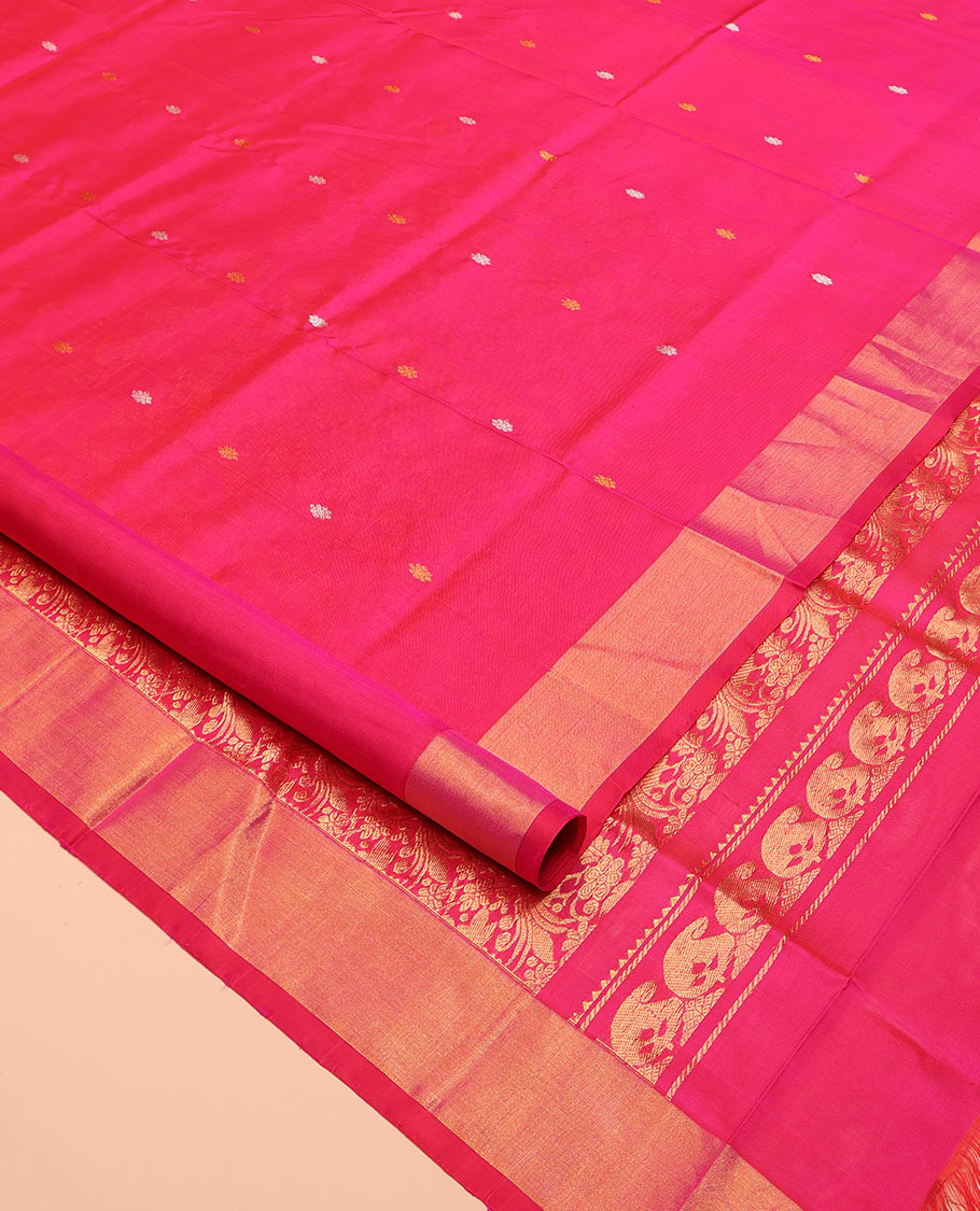Pink Uppada Silk Saree, Detailed with Zari Buttas All Over Its Body, Highlighted by a Zari Bavanji Border, Pallu Steeped with Peacock Designs, and Paired with a Matching Blouse