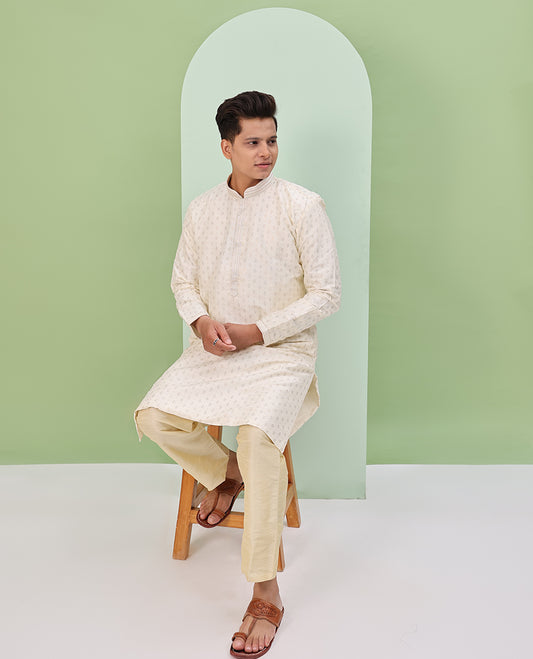 Light cream antique golden color buttas, and neck embroidered full-sleeved readymade kurta