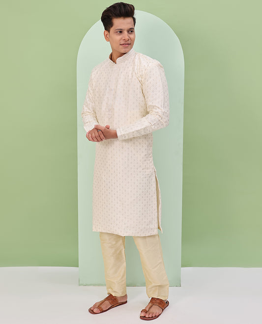 Light cream antique golden color buttas, and neck embroidered full-sleeved readymade kurta