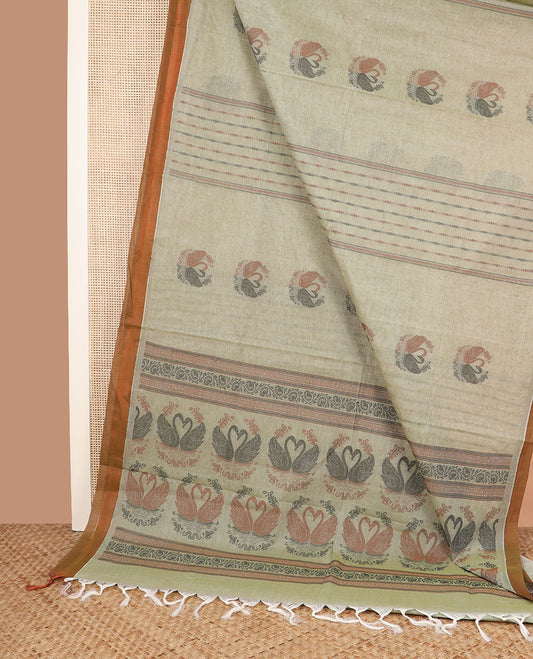 Pale green buttas and striped coimbatore cotton saree, contrast plain border and pallu of Swan motifs