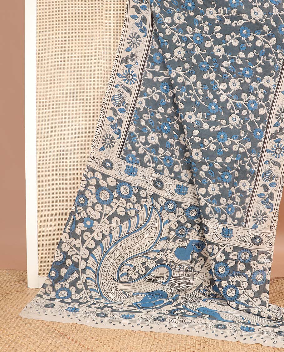 Grey floral vine machine printed kalamkari cotton saree, contrast floral-pot motifs printed border, and pallu of peacock print