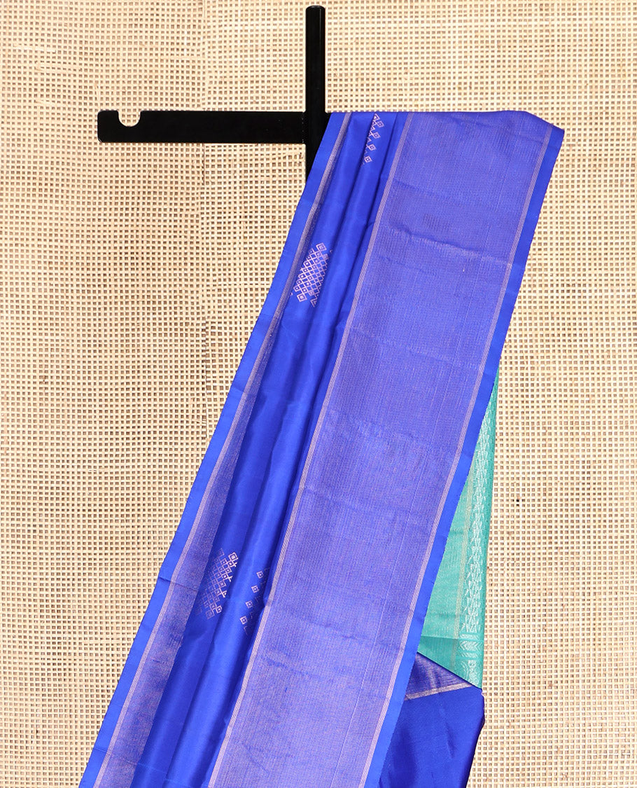 Blue Kanchipuram Silk Saree, Artfully Detailed with Neli Kolam Buttas, Highlighted by Vaira Oosi Striped Border, Contrast Geometric Pallu, and a Contrast Blouse
