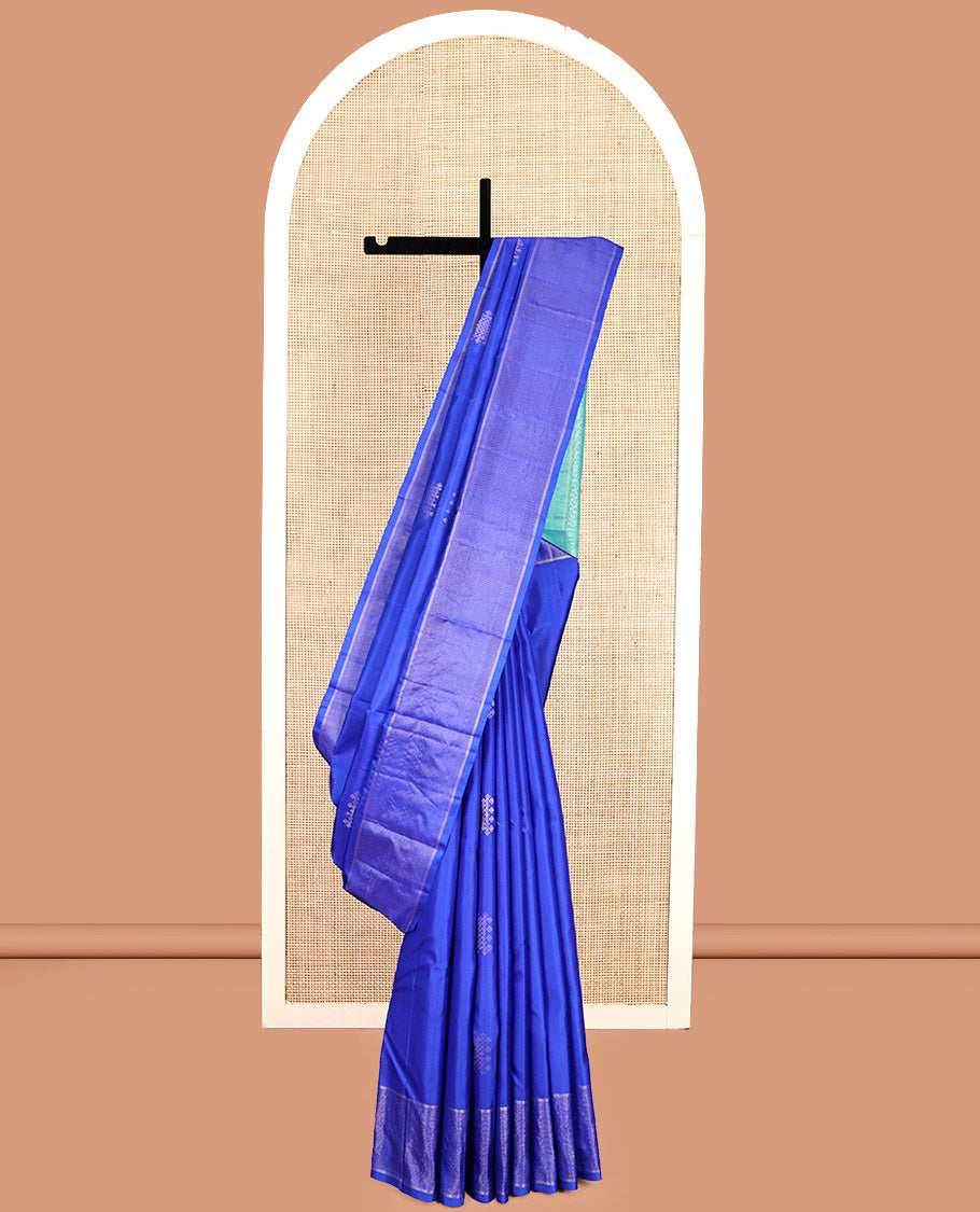 Blue Kanchipuram Silk Saree, Artfully Detailed with Neli Kolam Buttas, Highlighted by Vaira Oosi Striped Border, Contrast Geometric Pallu, and a Contrast Blouse
