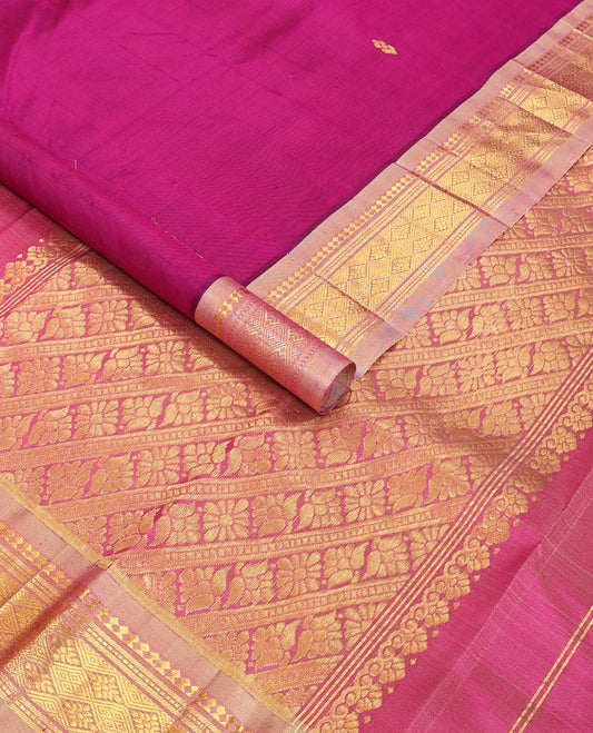 Dark pink buttas kancheepuram silk saree with contrast border of rekku, muthu, banaras, geometric design & floral pallu
