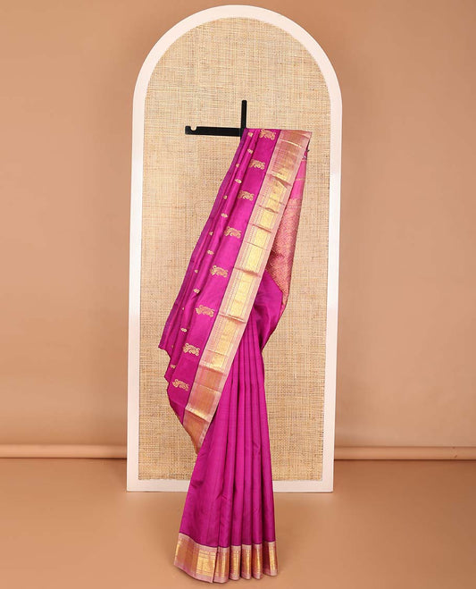 Dark pink buttas kancheepuram silk saree with contrast border of rekku, muthu, banaras, geometric design & floral pallu