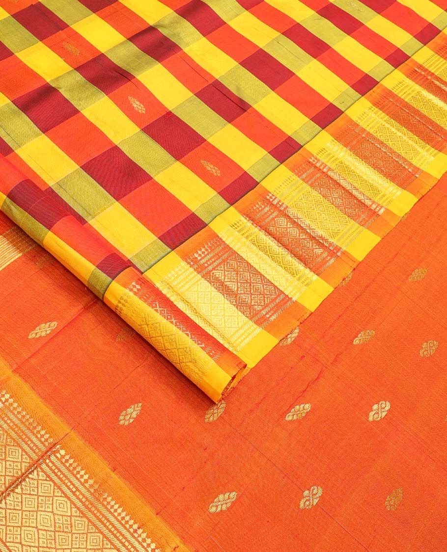 Multi-color checked and zari buttas Kanchipuram silk saree, one-sided border of paneer sombu, banaras, muthu, and jaal designs, and zari design pallu
