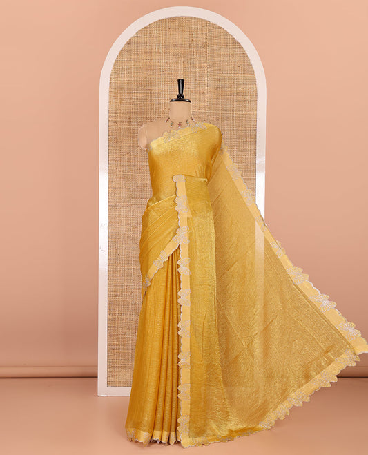 Yellow plain fendy chiffon saree, scallop border of butterfly motifs in stone work, self-pallu, and a matching blouse
