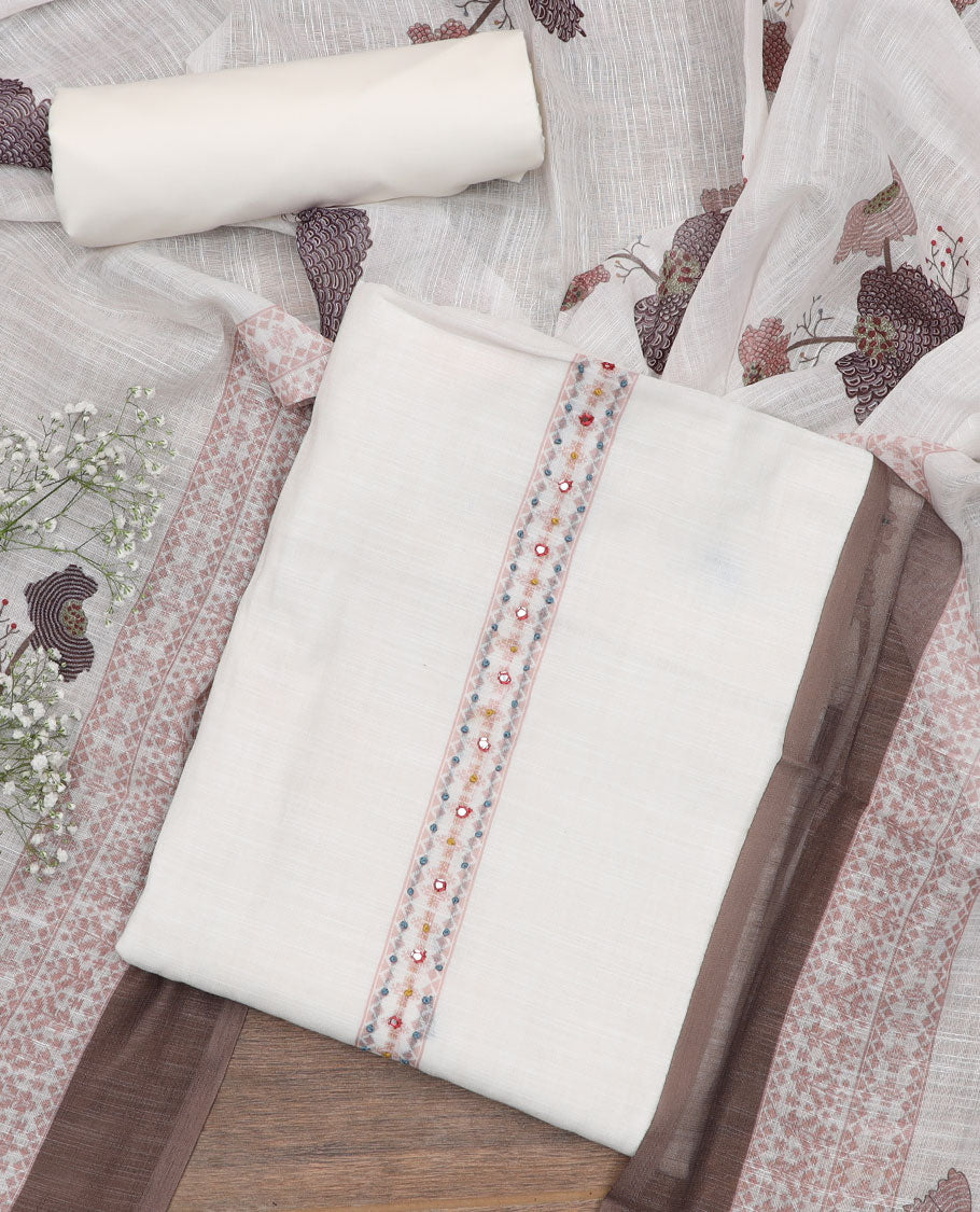 Cream material churidar set, floral motifs embroidered top, plain bottom, and a intricately printed dupatta