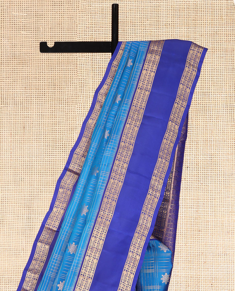 Blue Vasundhara Lite Silk Mix Saree, Gleamed Up with Zari Buttas and Checks, a Contrast Rettai Pettu Border of Meen and Kamalam Designs, Grand Pallu, and a Contrast Blouse