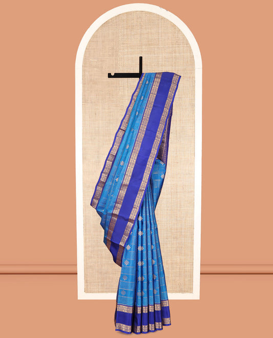 Blue Vasundhara Lite Silk Mix Saree, Gleamed Up with Zari Buttas and Checks, a Contrast Rettai Pettu Border of Meen and Kamalam Designs, Grand Pallu, and a Contrast Blouse