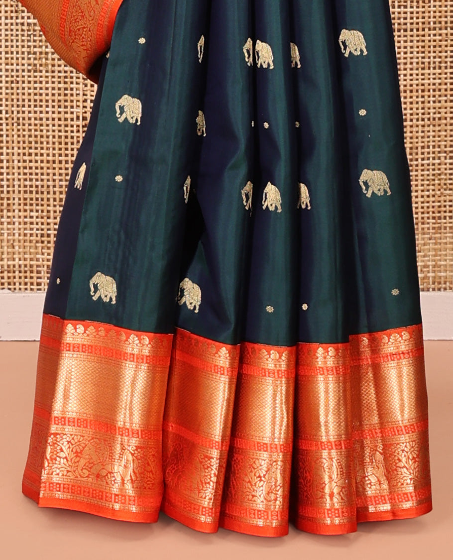 Blue Vasundhara Silk Saree, Embellished with Zari Buttas All Over Its Body, Complemented by a Contrast Border of Kuyil Kann, and Yaanai Designs, Grand Jaal Pallu, and Paired with a Contrast Blouse