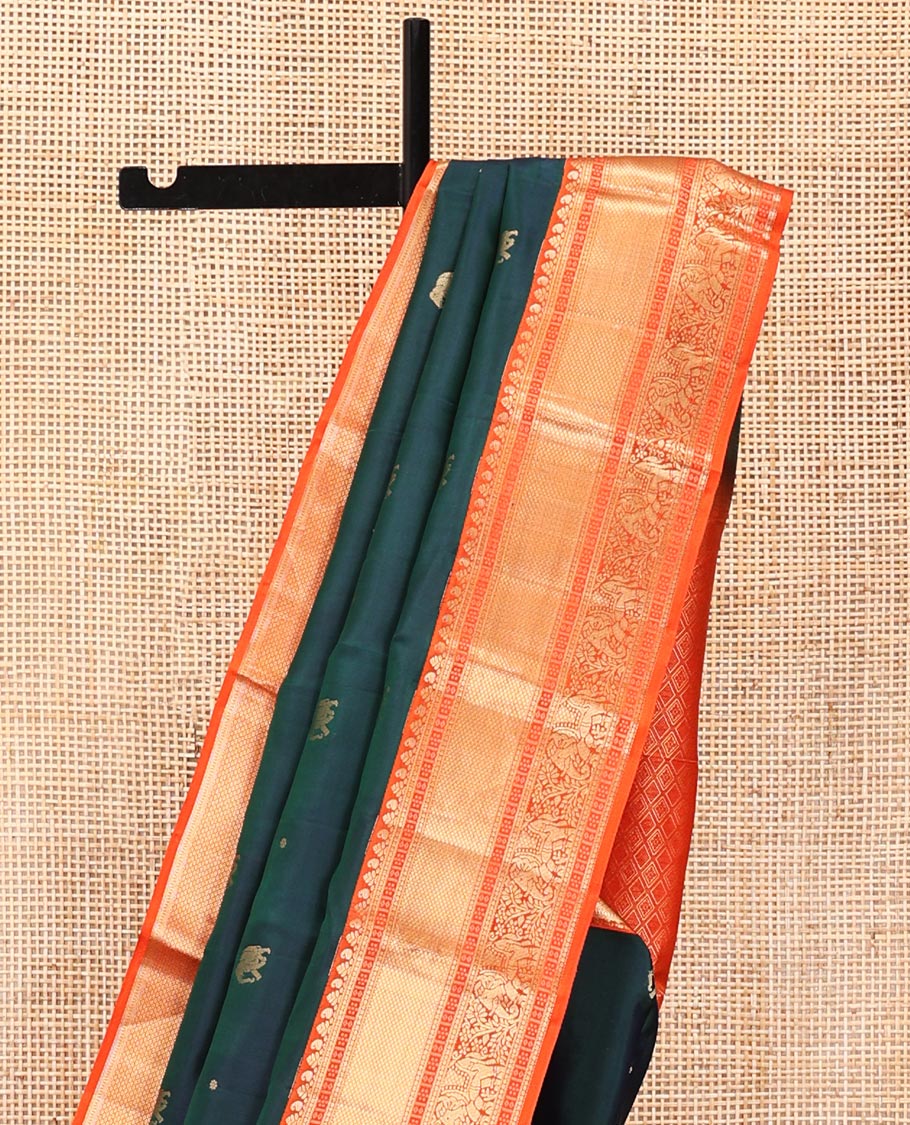 Blue Vasundhara Silk Saree, Embellished with Zari Buttas All Over Its Body, Complemented by a Contrast Border of Kuyil Kann, and Yaanai Designs, Grand Jaal Pallu, and Paired with a Contrast Blouse