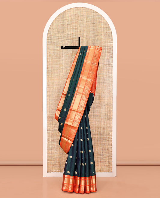 Blue Vasundhara Silk Saree, Embellished with Zari Buttas All Over Its Body, Complemented by a Contrast Border of Kuyil Kann, and Yaanai Designs, Grand Jaal Pallu, and Paired with a Contrast Blouse