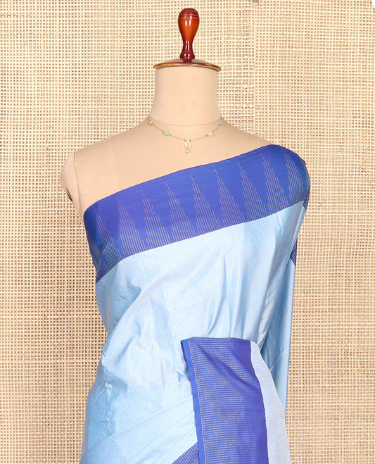 Blue Aarani Silk Saree, Dazzled with Stripes on Its Body, Complemented by a Contrast Temple Border, Pallu of Stripes, and Paired with a Matching Blouse