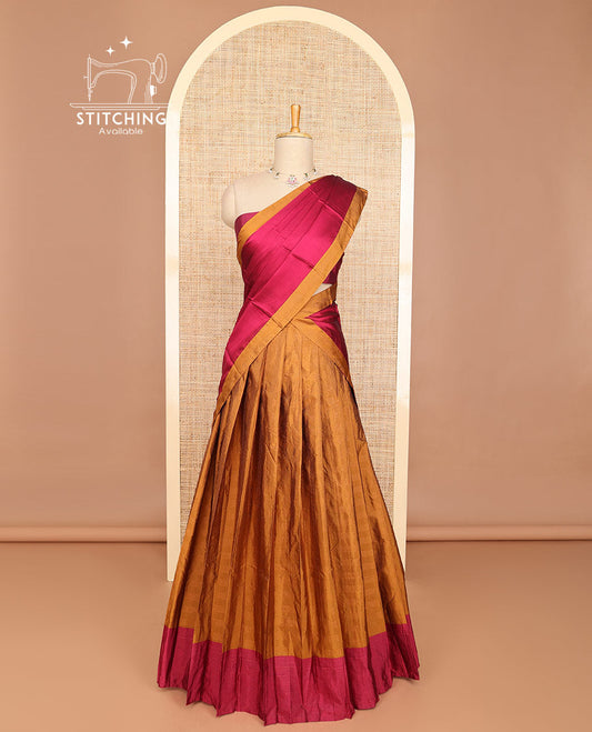 Brown striped half saree with contrast border, plain blouse & plain, checked border dhavani