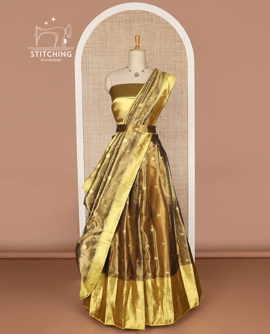 Brown buttas tissue half saree with contrast zari design border, checked zari design blouse & floral design dhavani