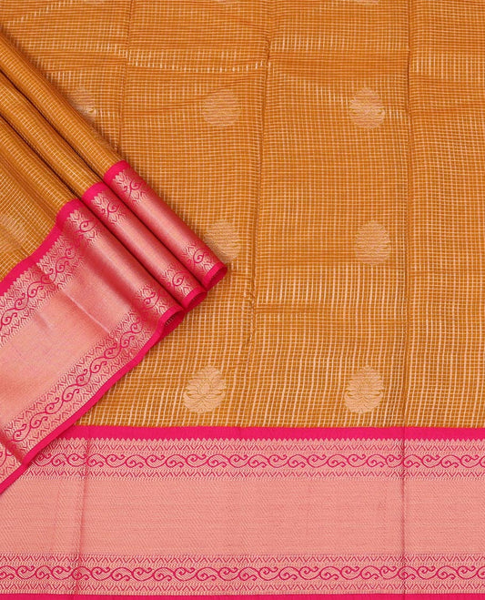 Mustard Art Silk Pavadai Material Set Featuring a Zari Butta Enclosed Checked Skirt, Complemented by a Contrast Traditional Zari Motifs Woven Border, and Paired with a Contrast Blouse