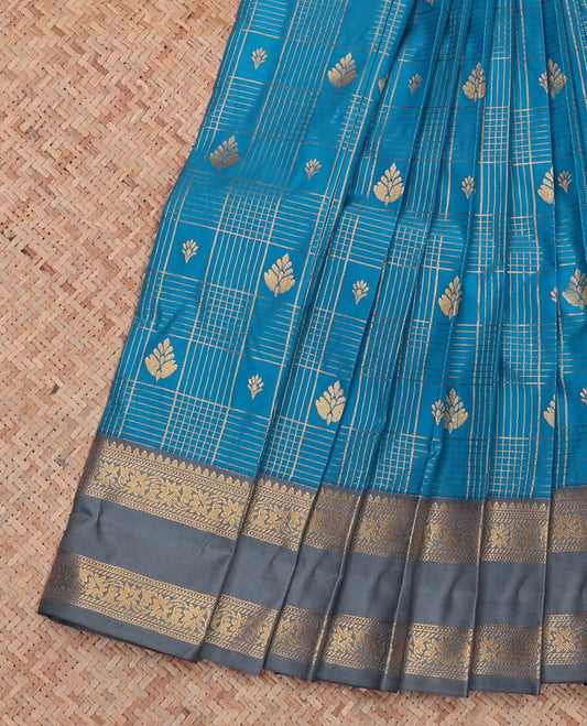 Blue zari butta enclosed checked budget silk saree, contrast traditional zari rettai pettu border, and intricate pallu