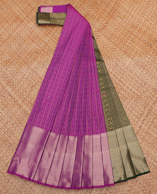 Purple Budget Silk Saree, Gracefully Embellished with Zari Stripes All Over Its Body, Highlighted by Traditional Zari Designs Woven Border, Contrast Grand Jaal Pallu, and Paired with a Contrast Blouse