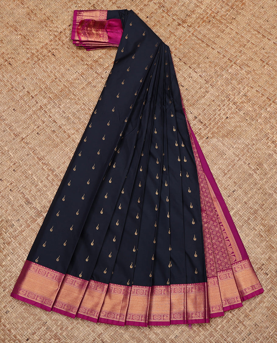 Navy Blue Budget Silk Saree, Decked Up with Zari Buttas All Over Its Body, Complemented by a Contrast Traditional Zari Peacock-Chakram Border, Grand Jaal Pallu, and Paired with a Contrast Blouse