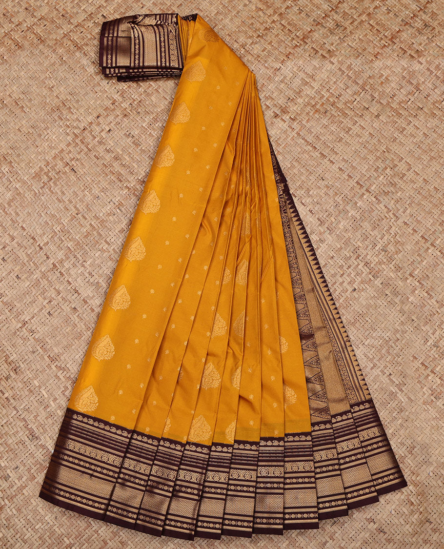 Yellow Budget Silk Saree, Spotlighted with Zari Buttas All Over Its Body, Complemented by a Contrast Traditional Zari Design Border, Grand Pallu, and Paired with a Contrast Blouse