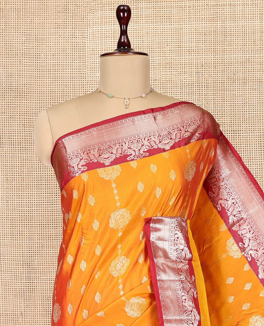 Orange Budget Silk Saree, Detailed with Zari Buttas, Complemented by a Contrast Traditional Border, Pallu of Jaal and Paisleys, and a Contrast Blouse