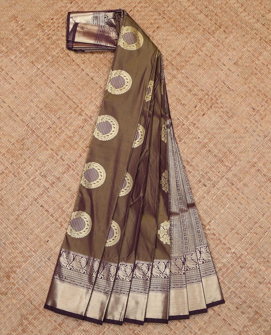 Brown Budget Silk Saree, Enhaced with Floral-Circular Buttas, a Contrast Traditional Peacock Zari Border, a Grand Pallu and a Contrast Blouse