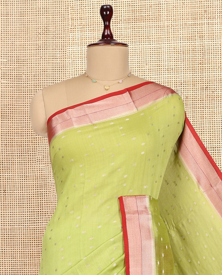 Green Assam Silk Saree, Graced with Zari Buttas, Complemented by Contrast Traditional Zari Border,  Zari Woven Pallu, and Contrast Blouse
